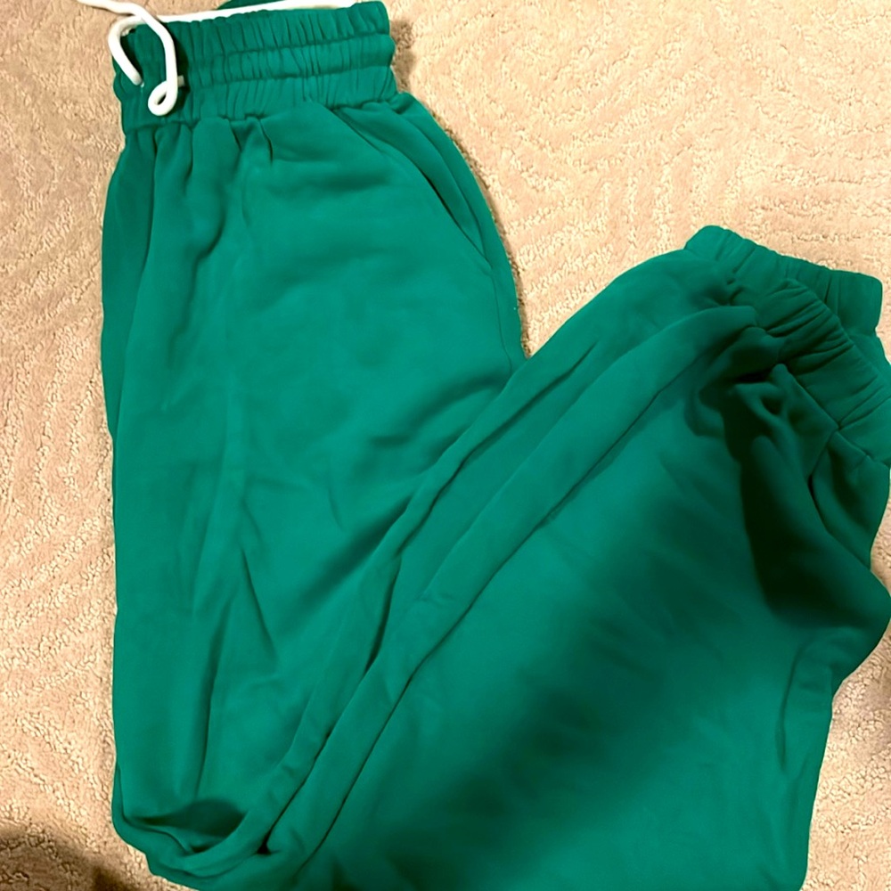 Green sweat pants